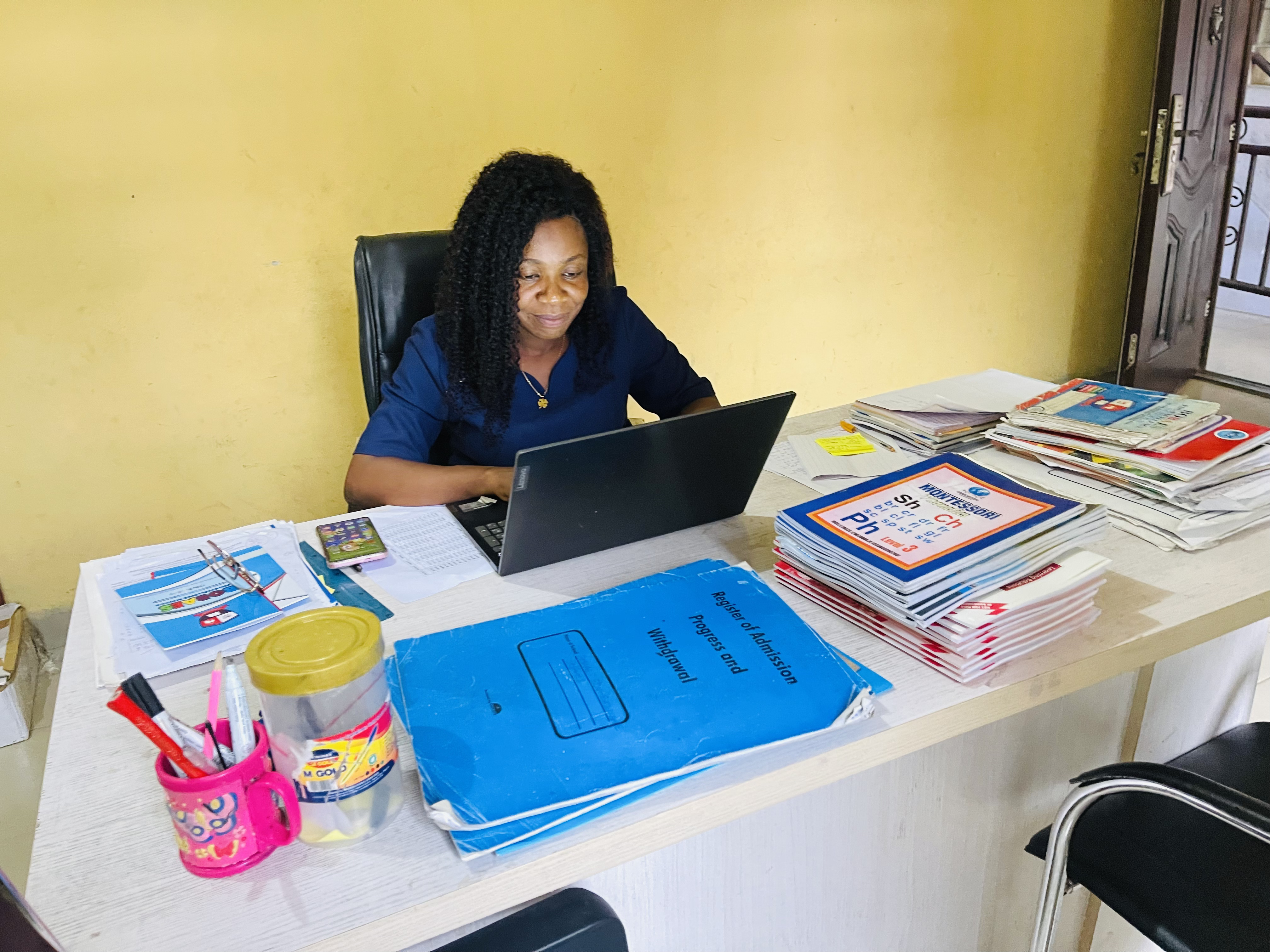 Ogochukwu M. Igboanugo seated at her desk