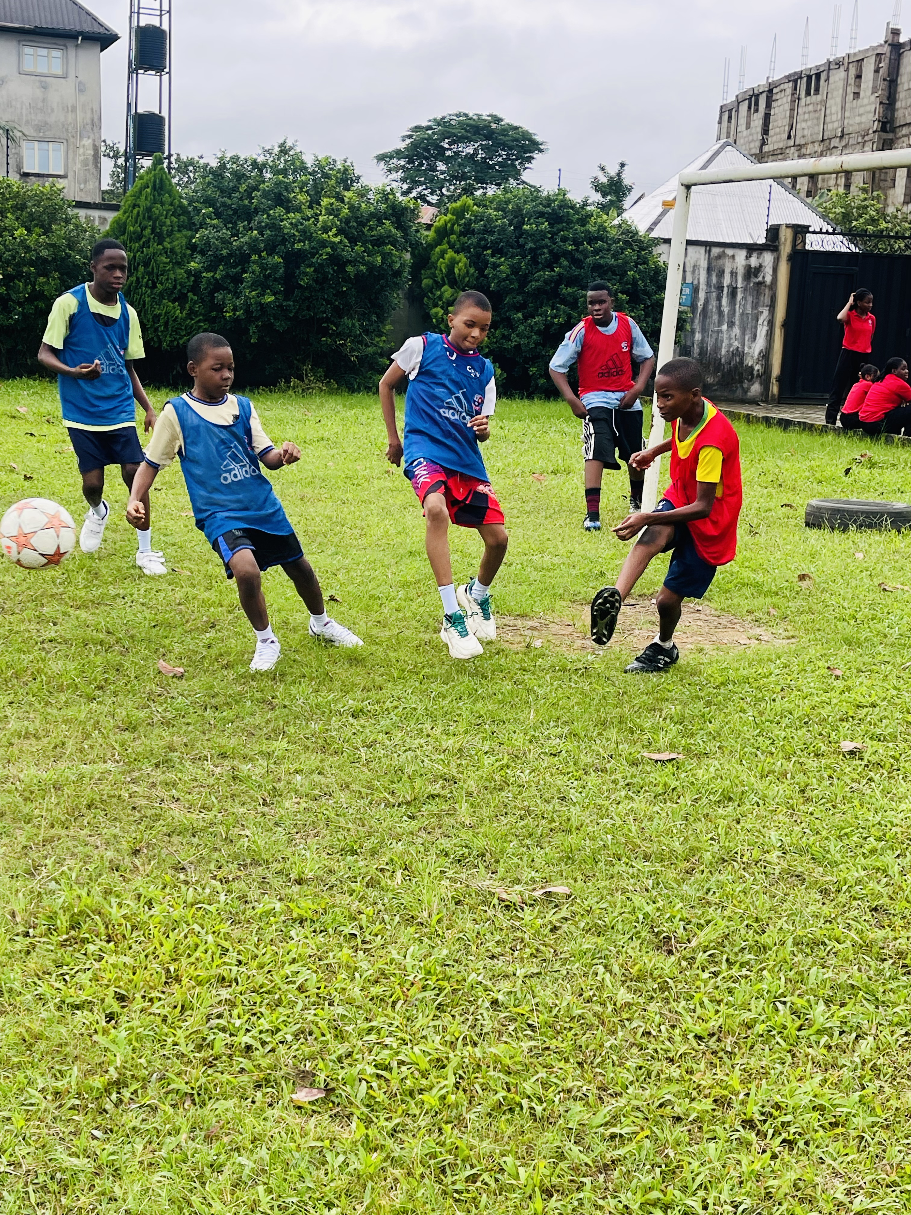 BOBAES pupils playing football on the school field